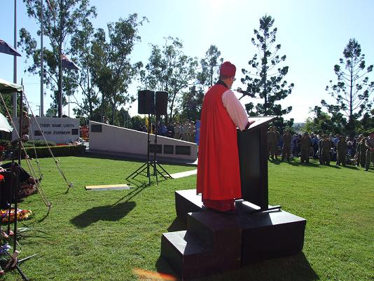 Archbishop Dr Peter McInnes podium preach